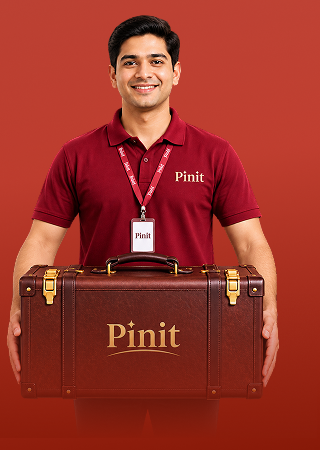 A uniformed Pinit representative carrying a branded Pinit suitcase